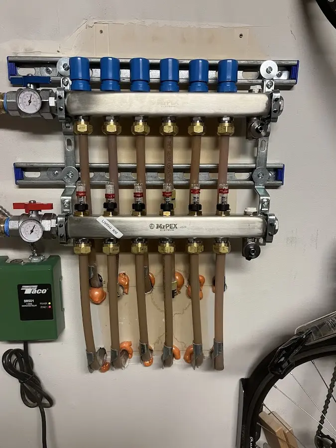 Plumber performing Gas Leak Detection at a residential property in Raisinville